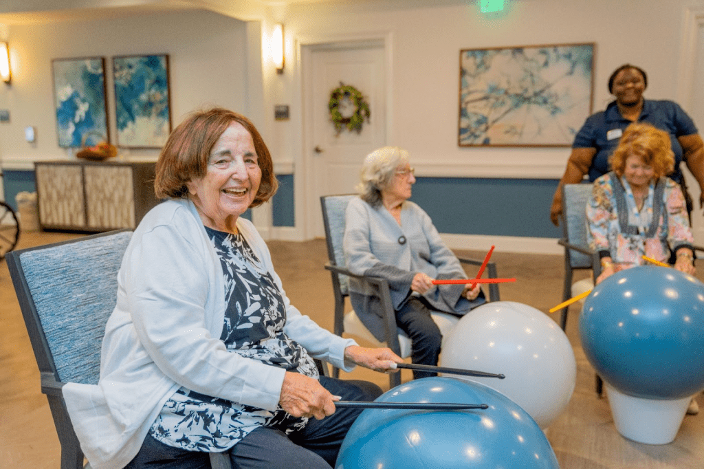 Residents of Alamar Senior Living engaging in an enriching activity at Alamar