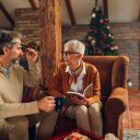 A resident at Alamar Senior Living making a care plan with her son for the holiday season