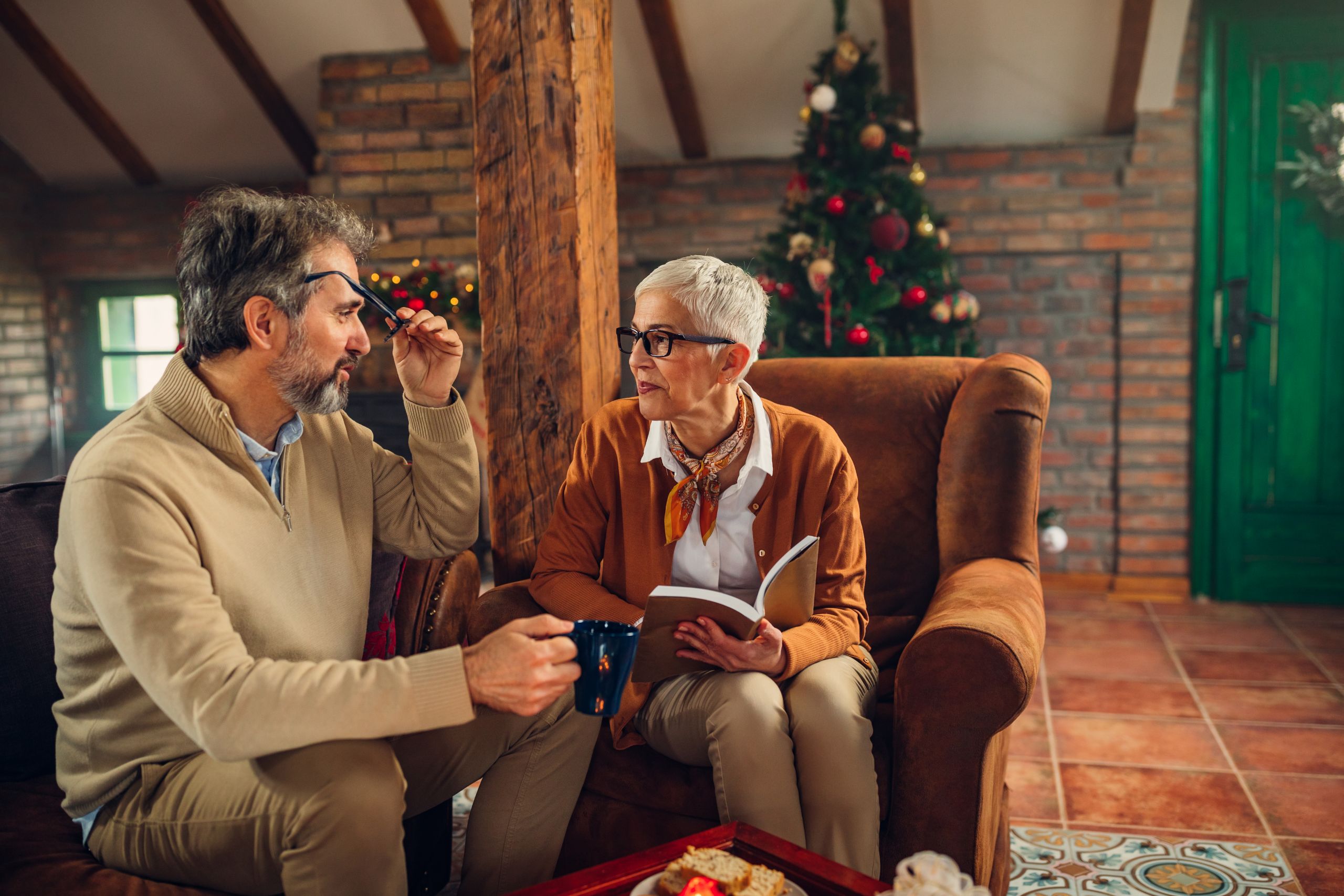 A resident at Alamar Senior Living making a care plan with her son for the holiday season