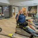 An older adult exercises at Alamar Senior Living to help prevent falls
